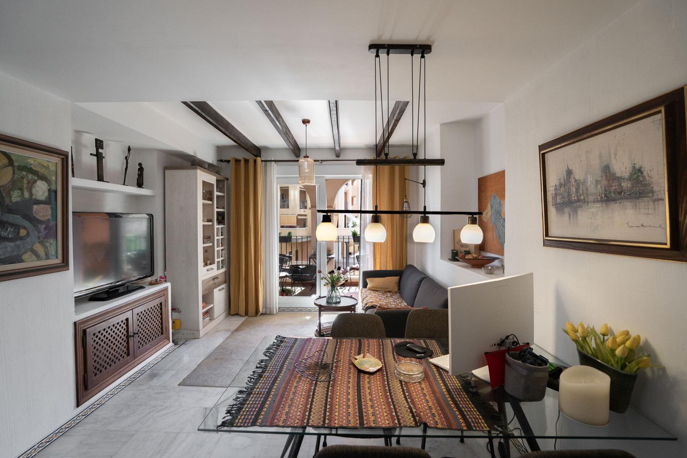 Living and dining room with timber beams